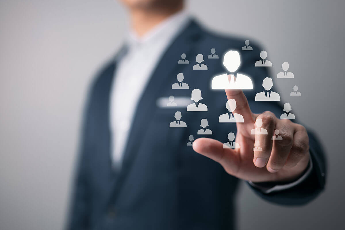 businessman selecting employee icons