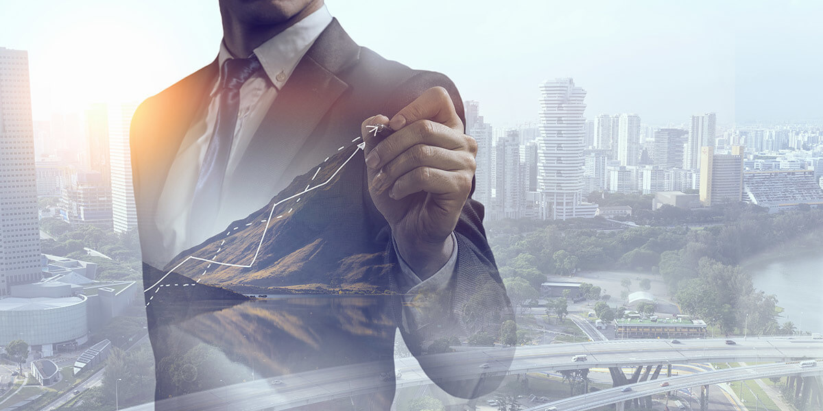 company growth businessman pointing at chart