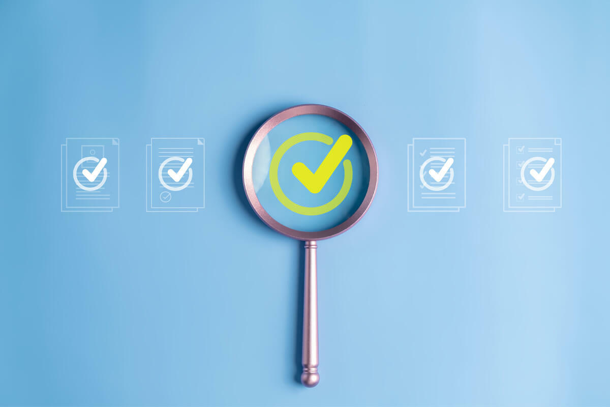 background checks magnifying glass with check marks