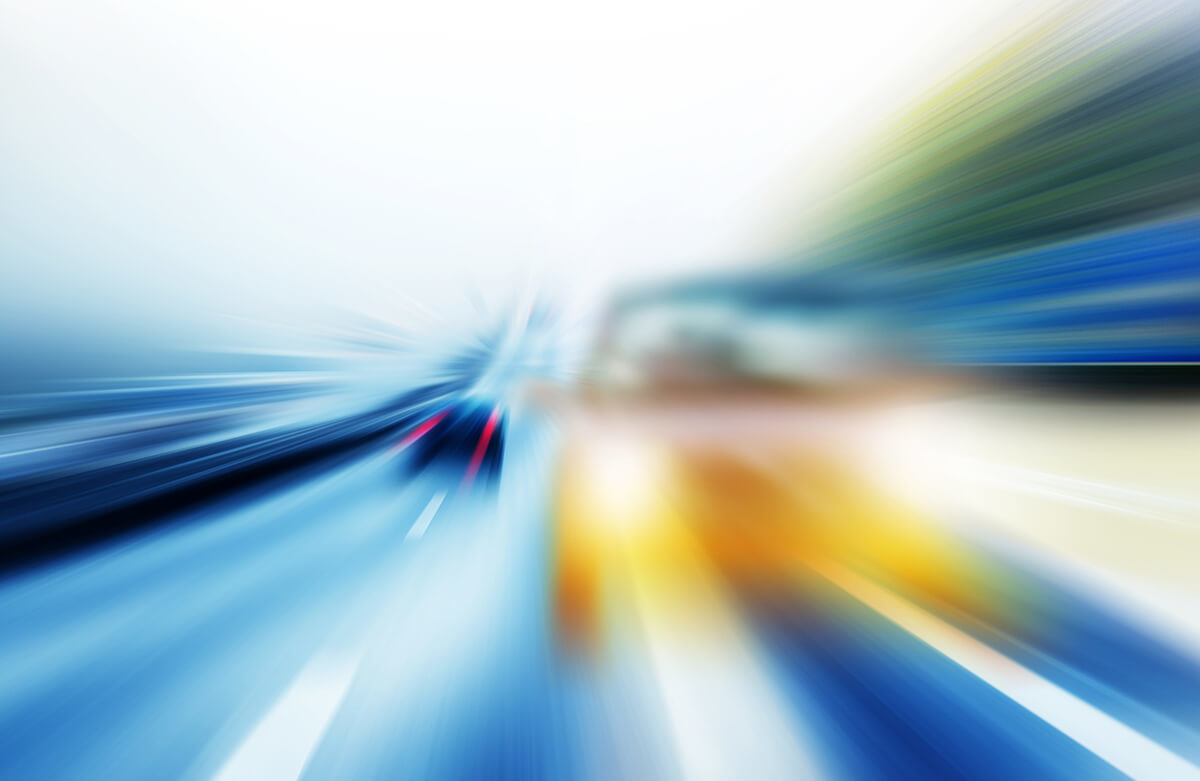 blurred roadway from the point of view of a driver