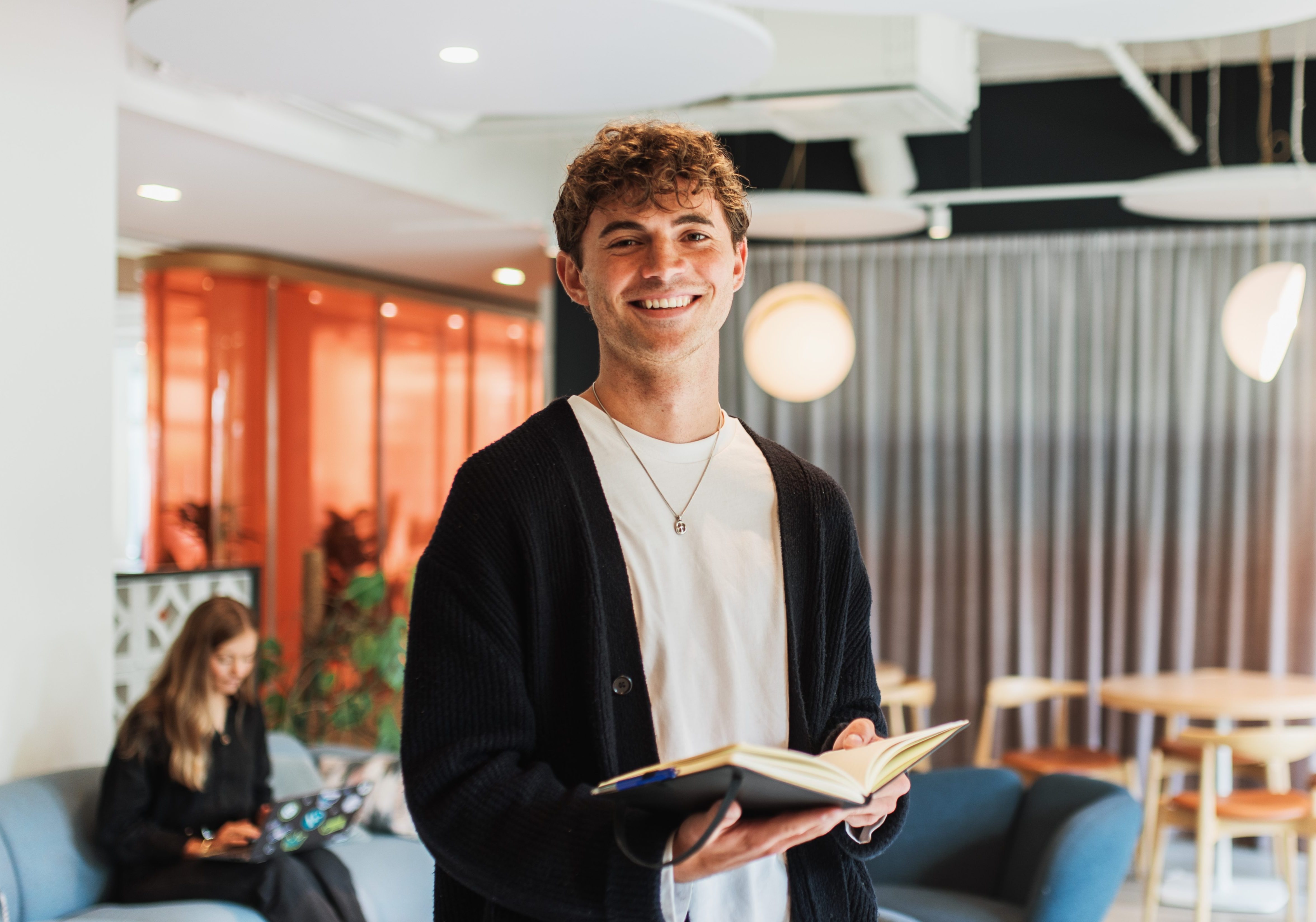 HR and candidate meeting and shaking hands over a signed employment contract