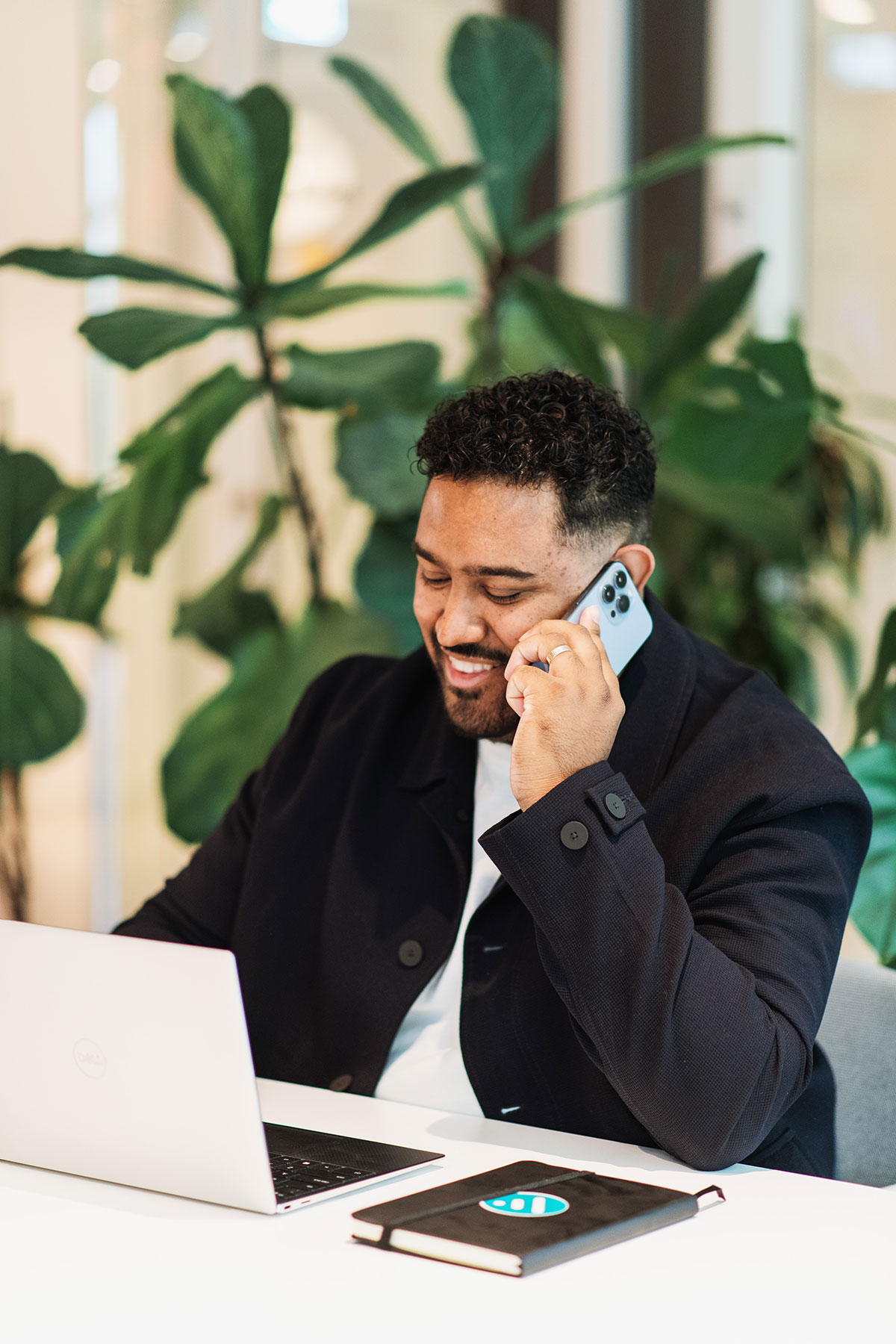 Employee talking about background checks on the phone