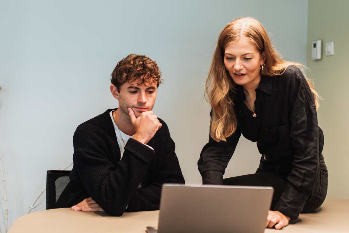 Two collegues discussing background checks