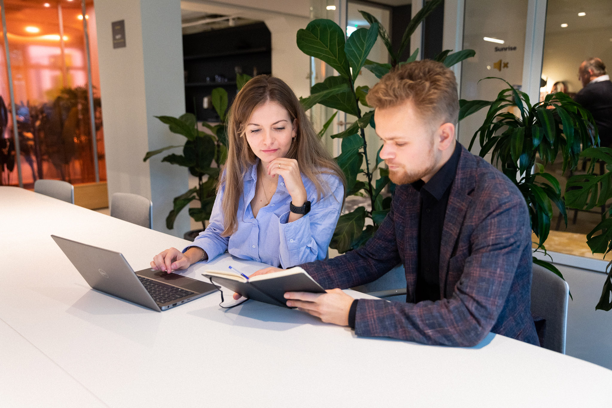 Two employees talks about background checks