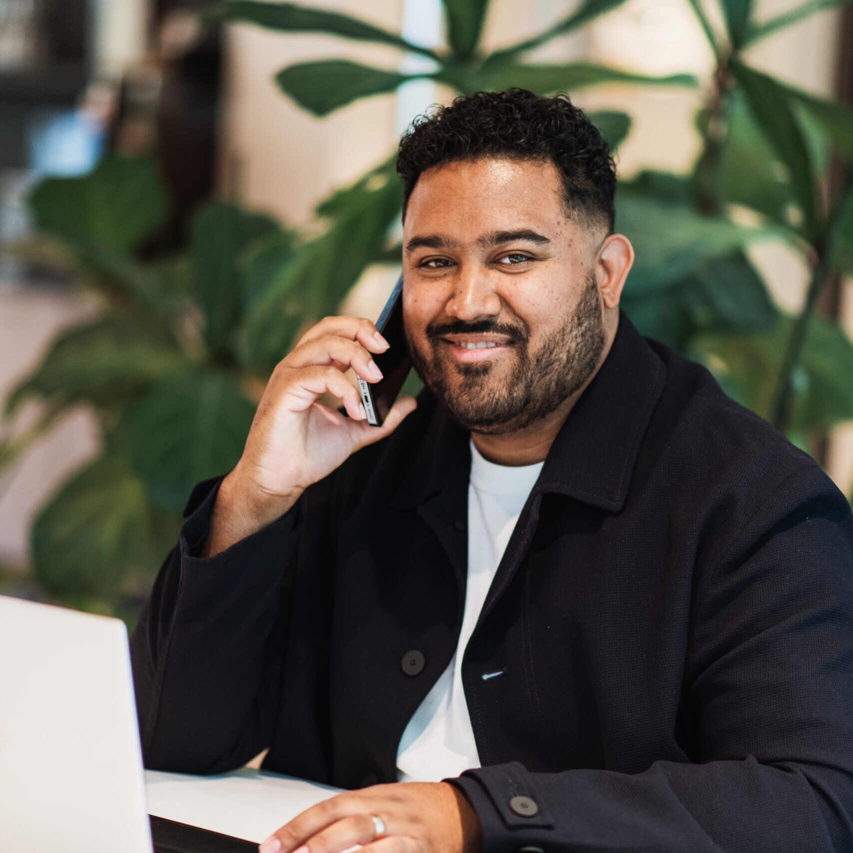 Male employee on the phone
