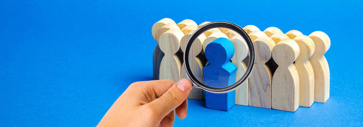 employee background checks magnifying glass searching for employee