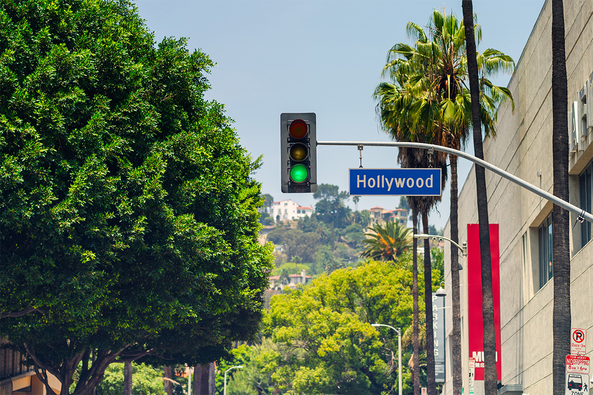 Hollywood Boulevard Street Sign with green traffic light