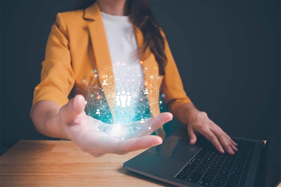 businesswoman holding circle global network