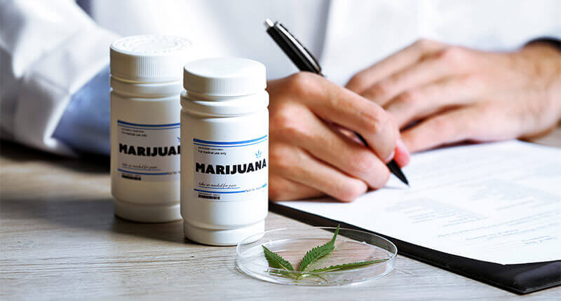doctor writing prescription for medical marijuana