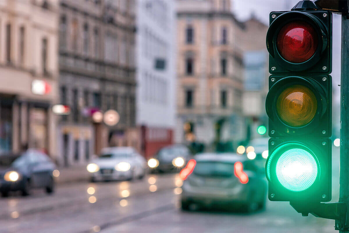 busy street with green traffic light