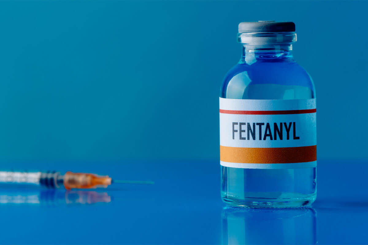 bottle of fentanyl and injection needle