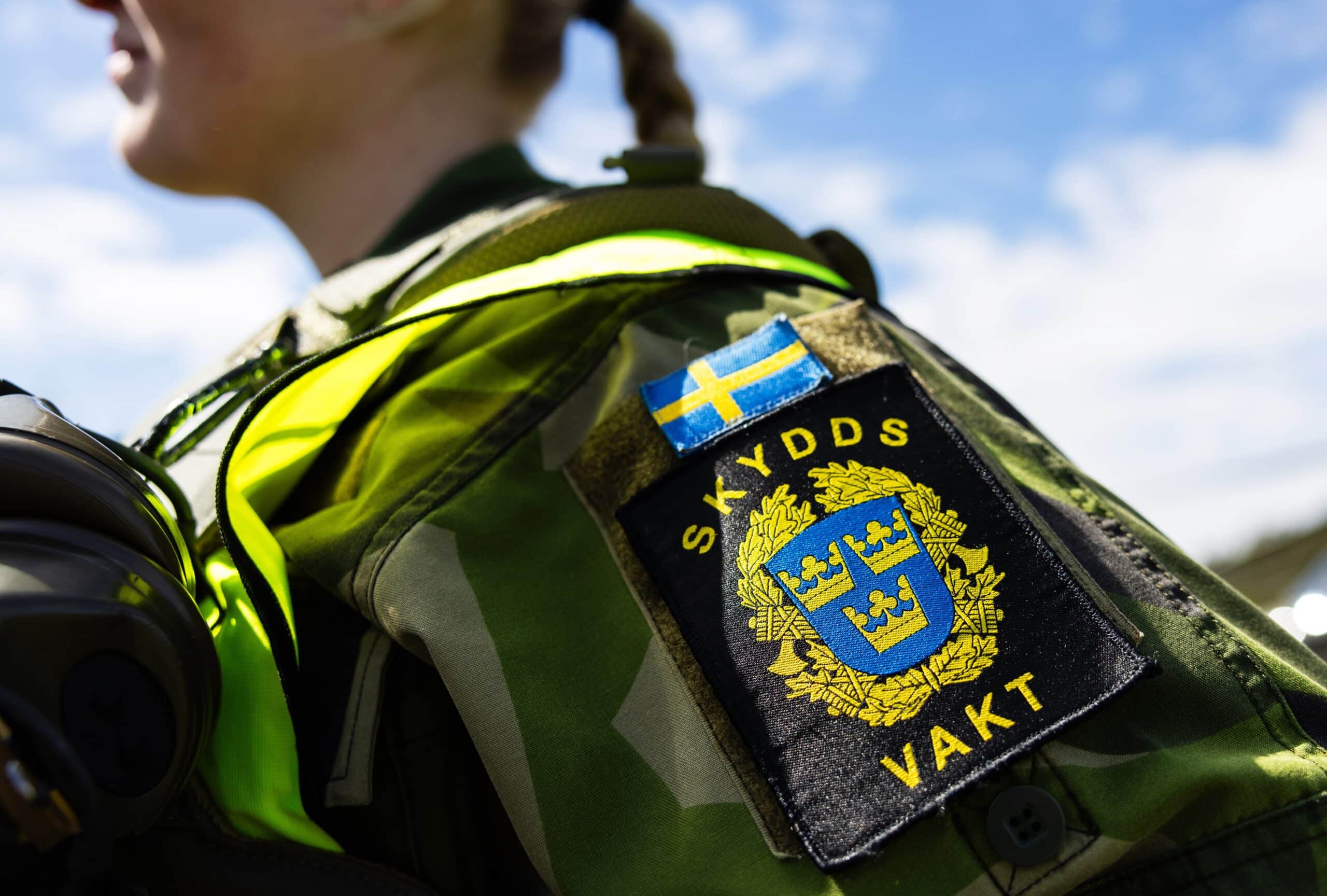 Sweden police officer with badge