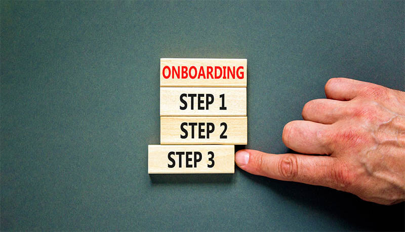 person pointing at onboarding steps 1, 2, and 3