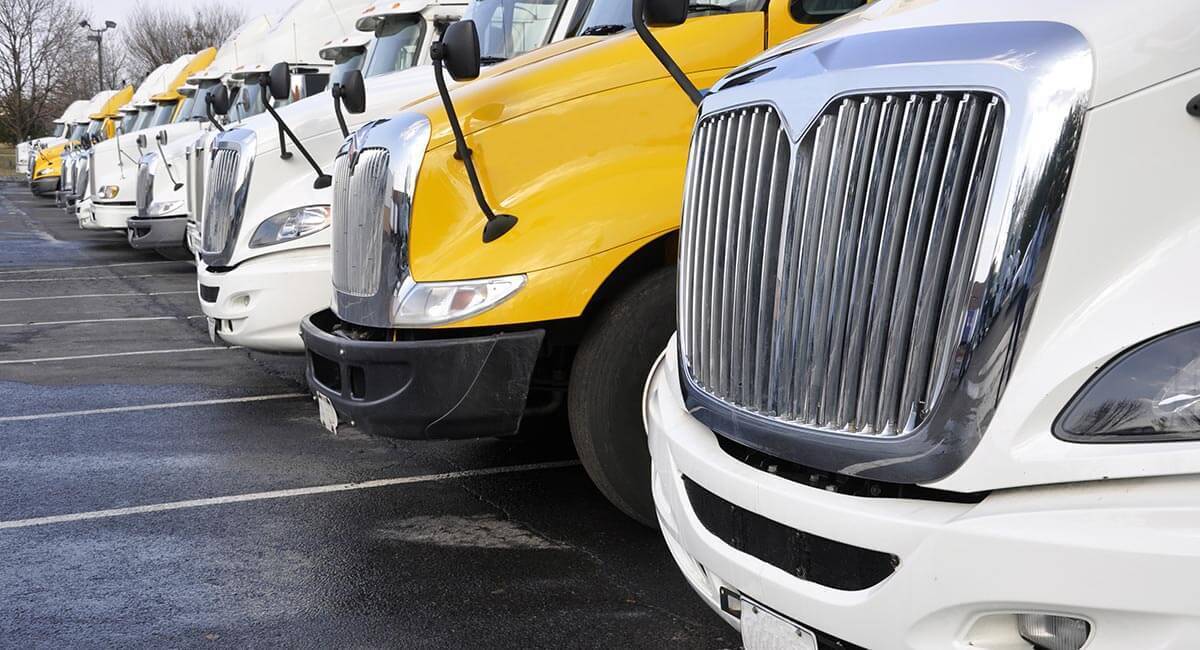 big rig truck front ends lined up