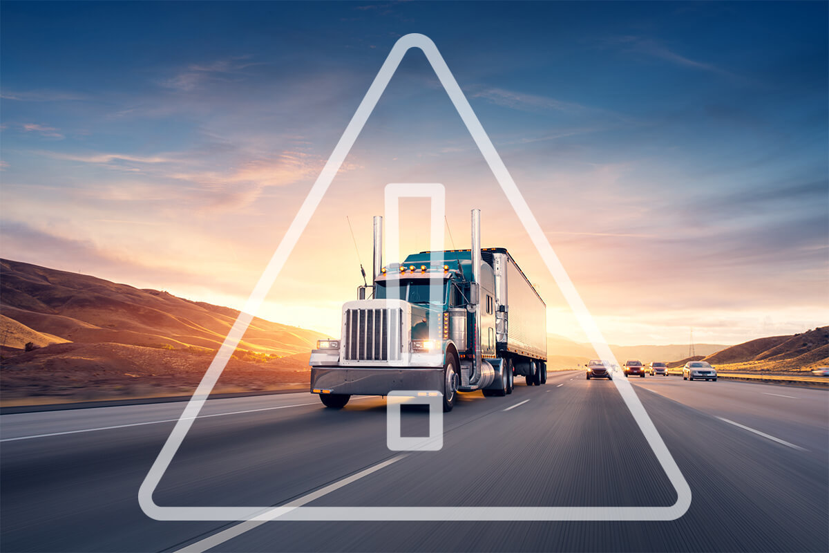 Long-Haul truck with a warning symbol super-imposed over it