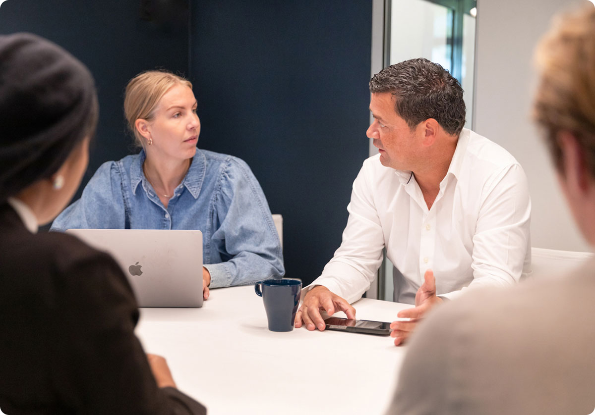Colleagues meeting in a conference room