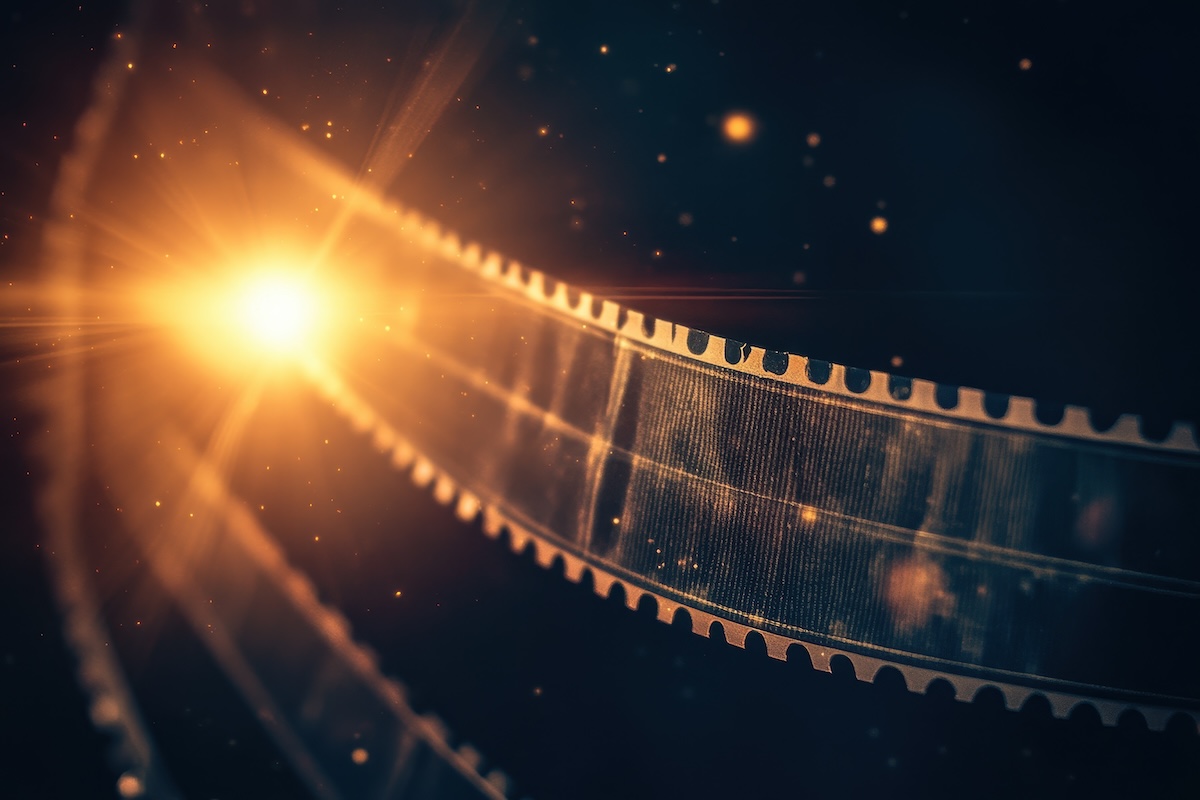 film reel with orange light burst