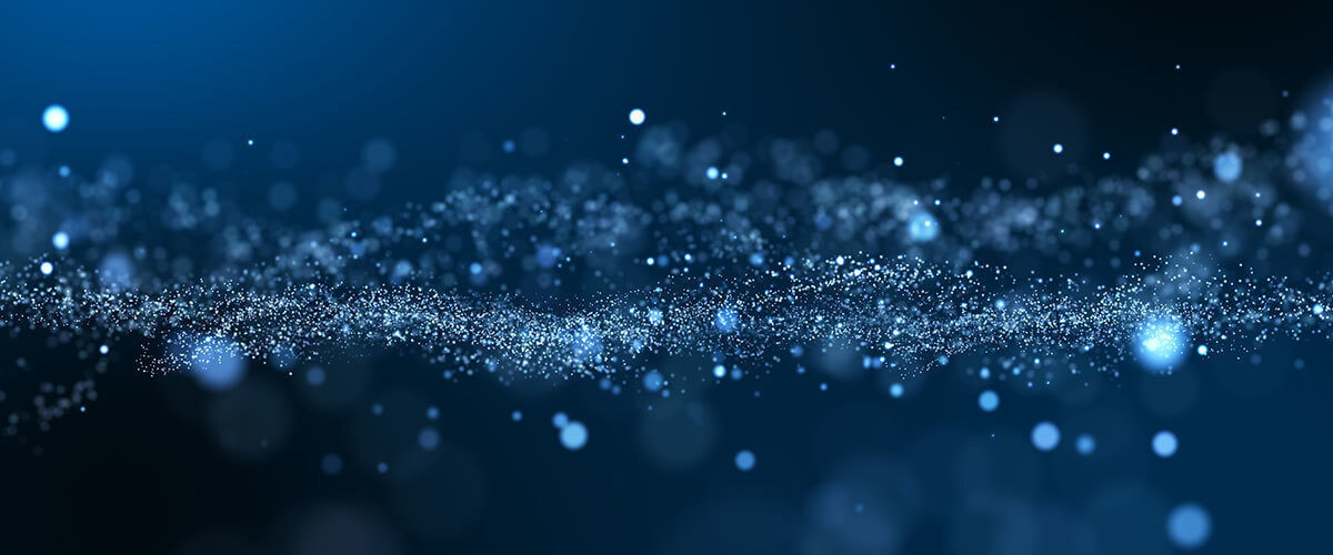 blue sparks flowing through a dark background