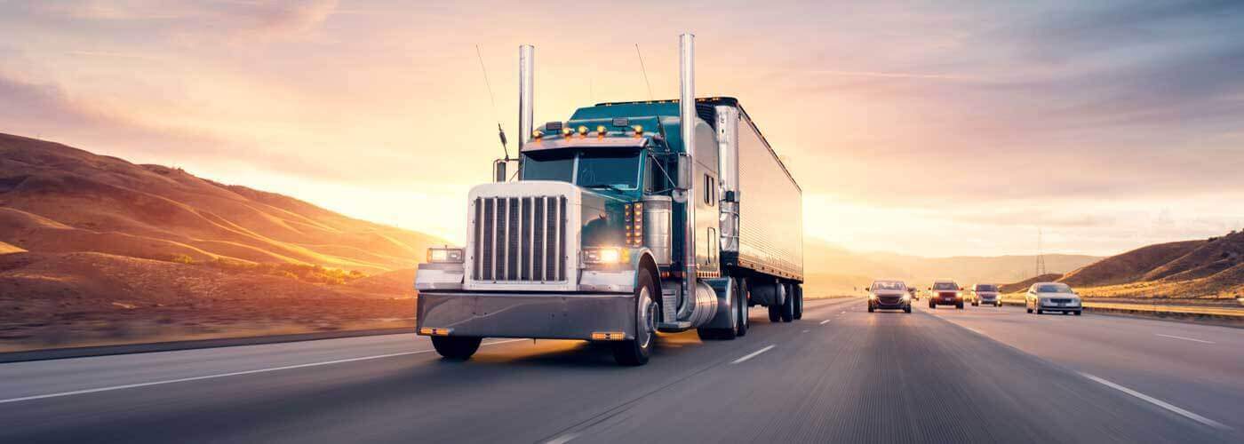 18 Wheeler Transport truck driving on the highway