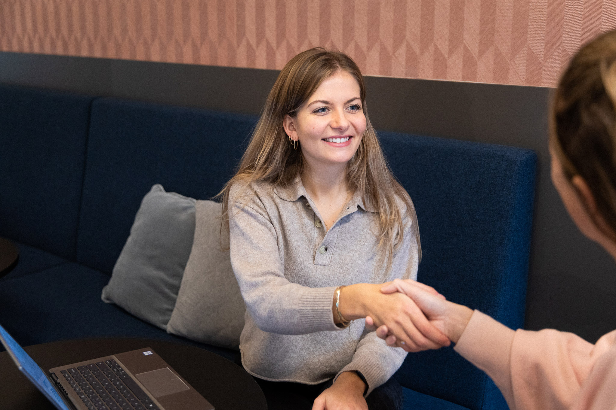 Employee shaking hands during interview