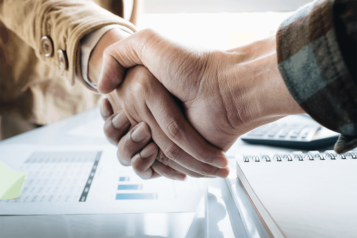 ODT Acquistion business agreement handshake