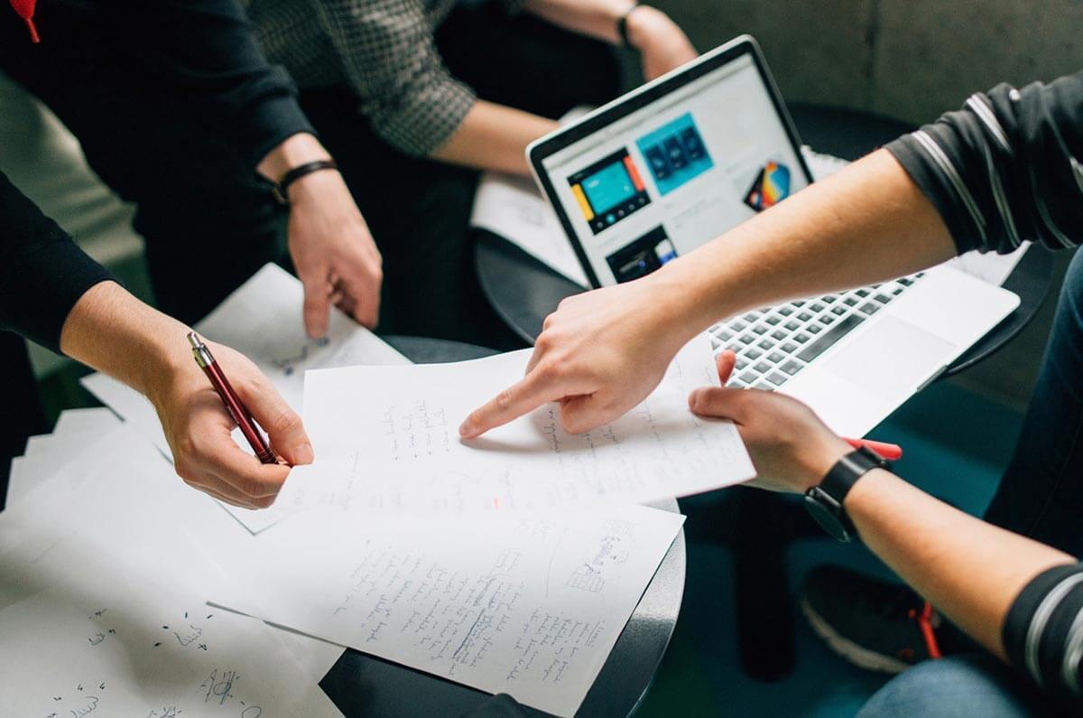 people reviewing documents