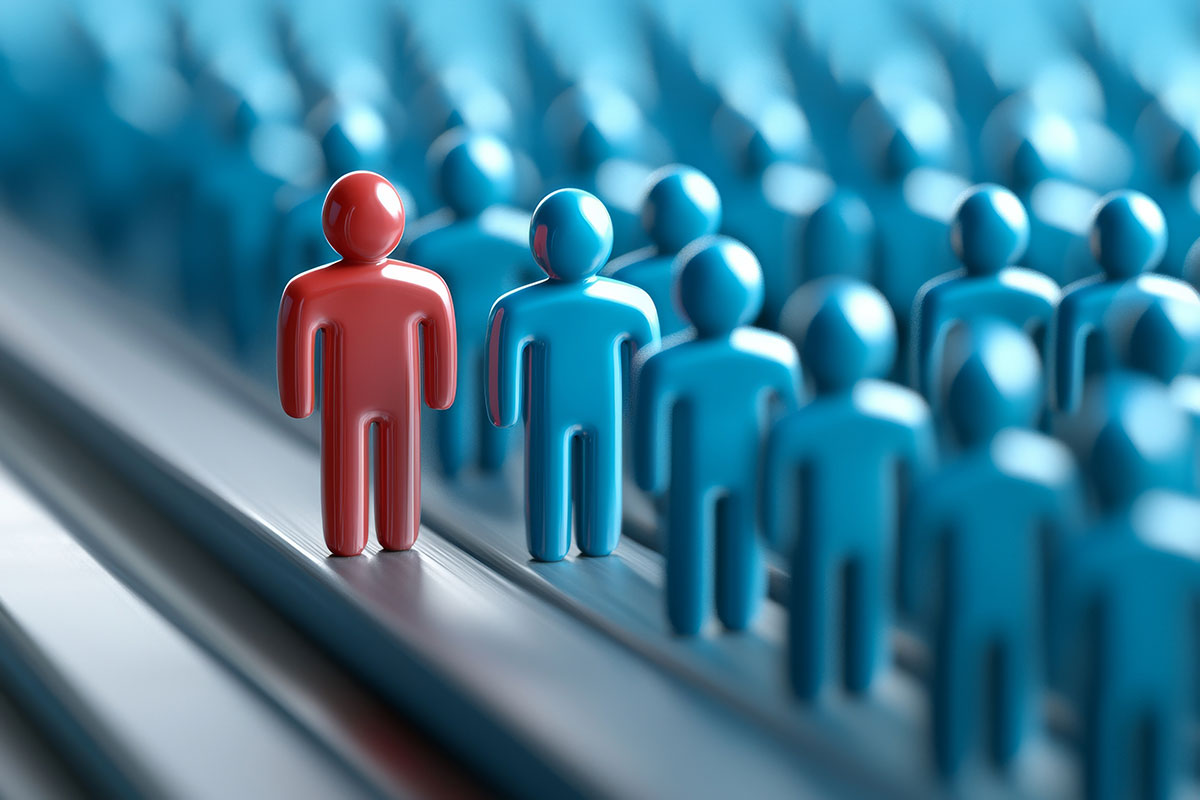 multitude of blue human figures with one red one symbolizing random choice