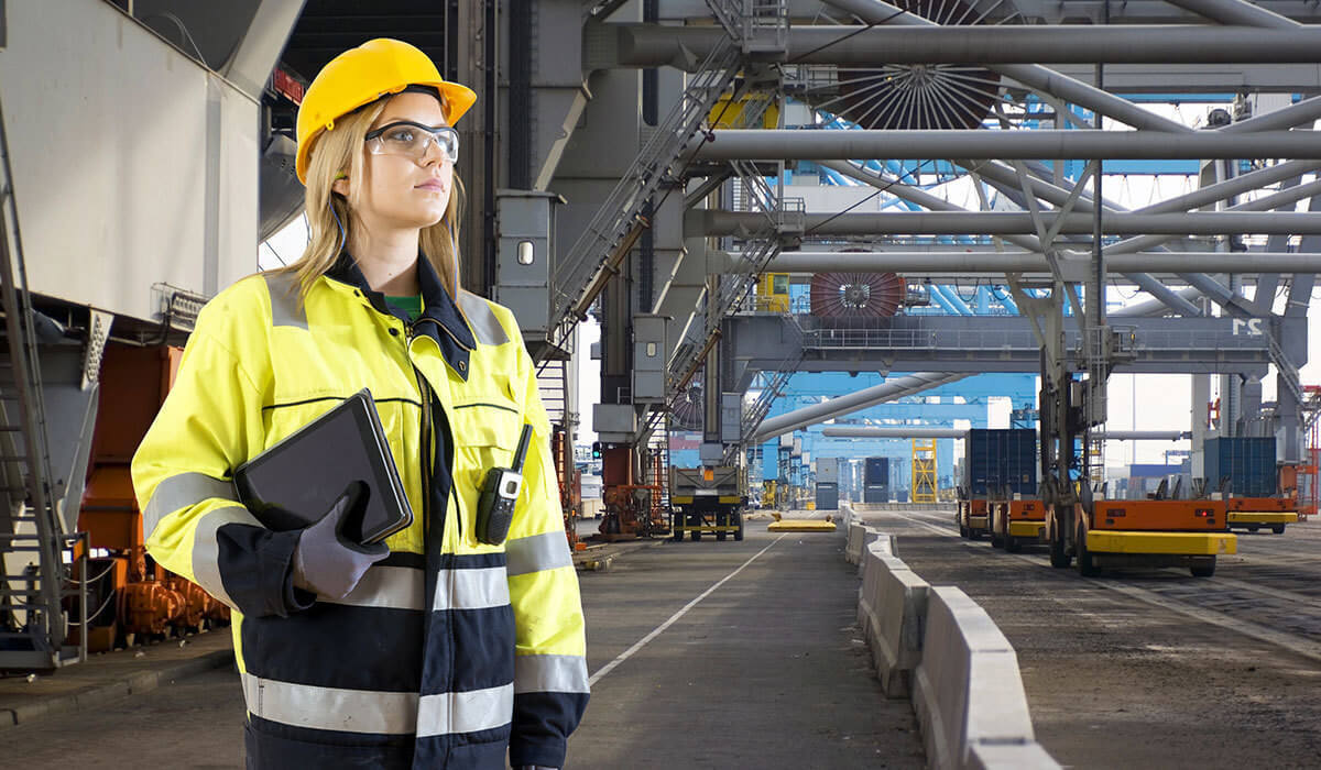 employee wearing safety glasses and hat