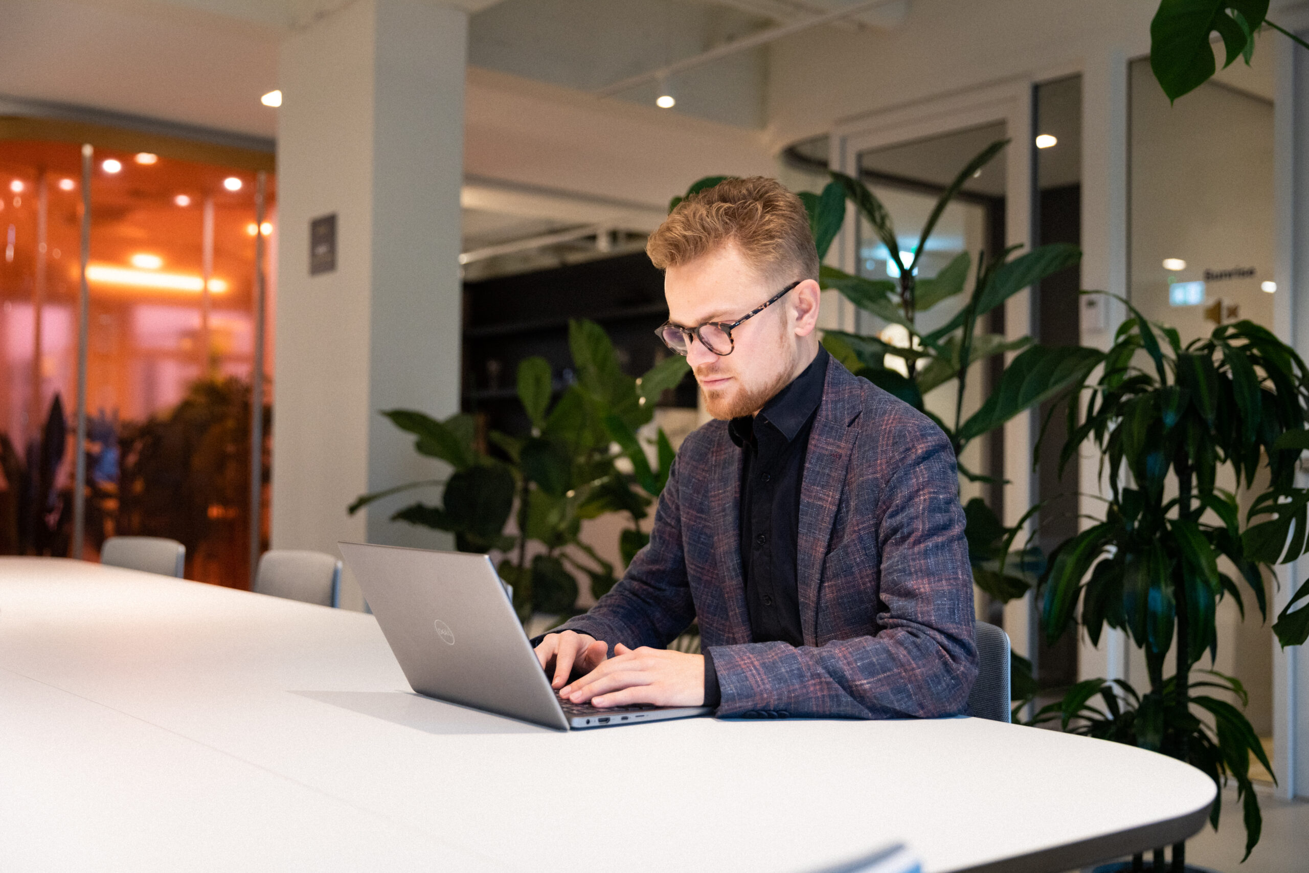 DISA employee working on his laptop