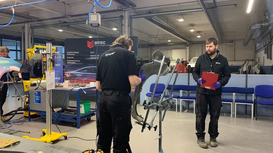 Two apprentices working in an Emtec workshop.