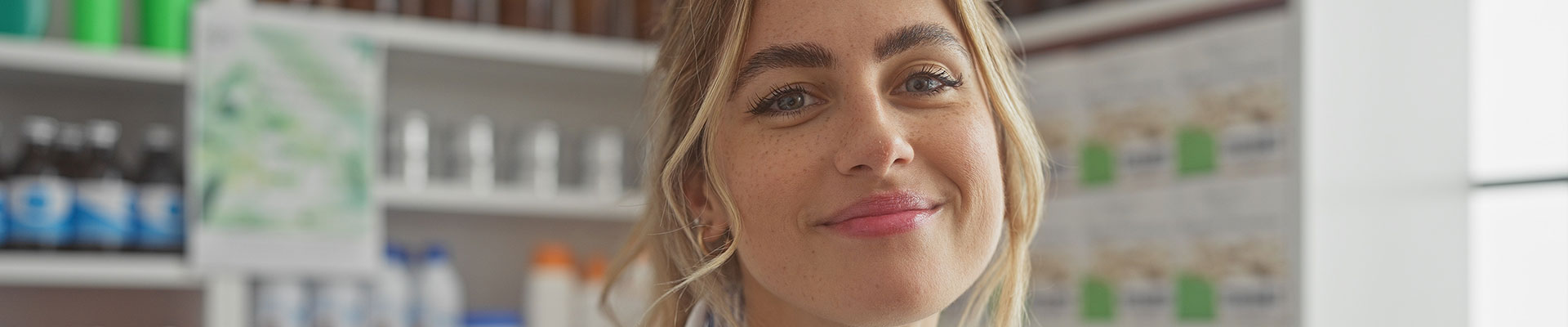 A young woman in a pharmacy