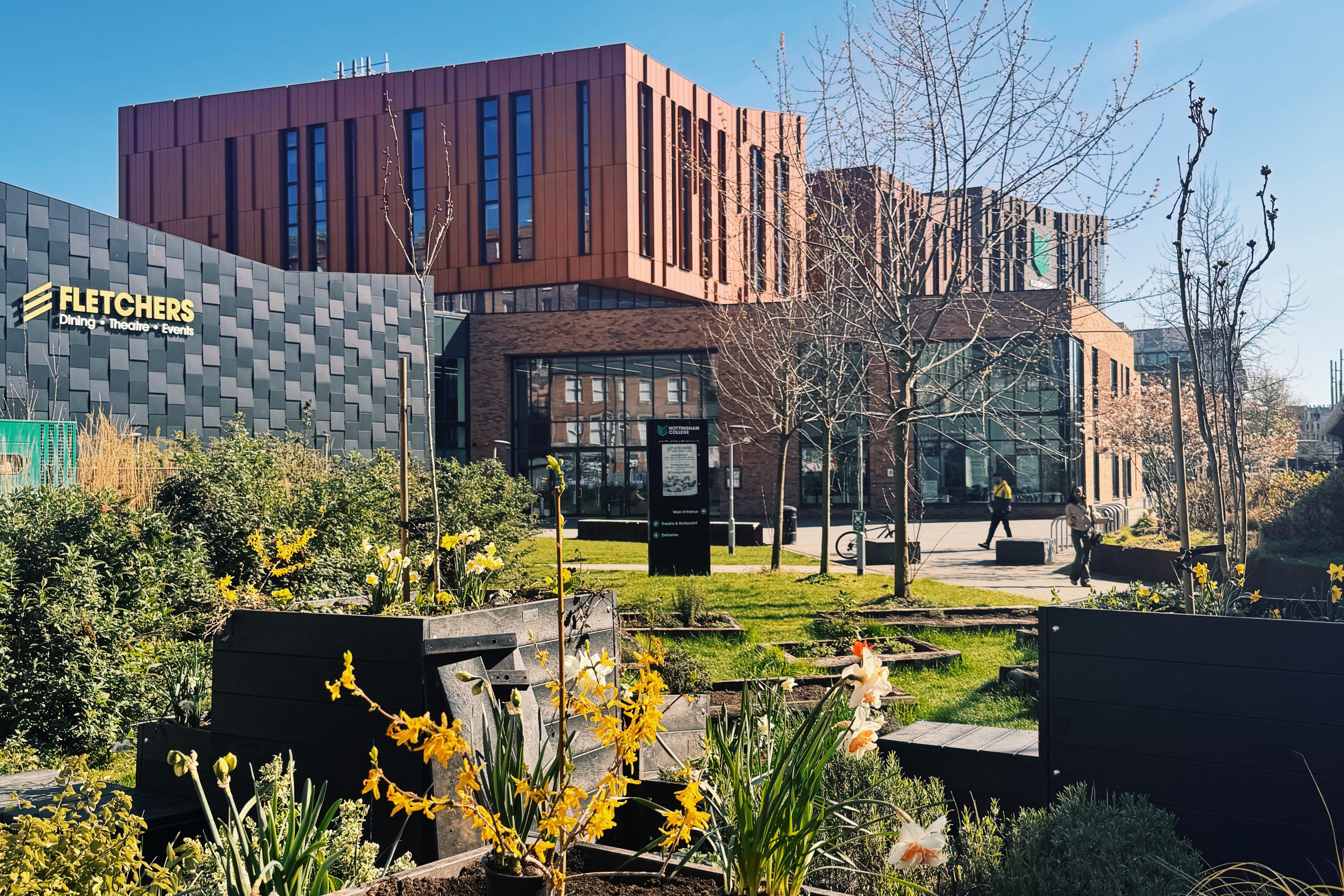 Flowers and plants outside of our City Hub campus in the sun