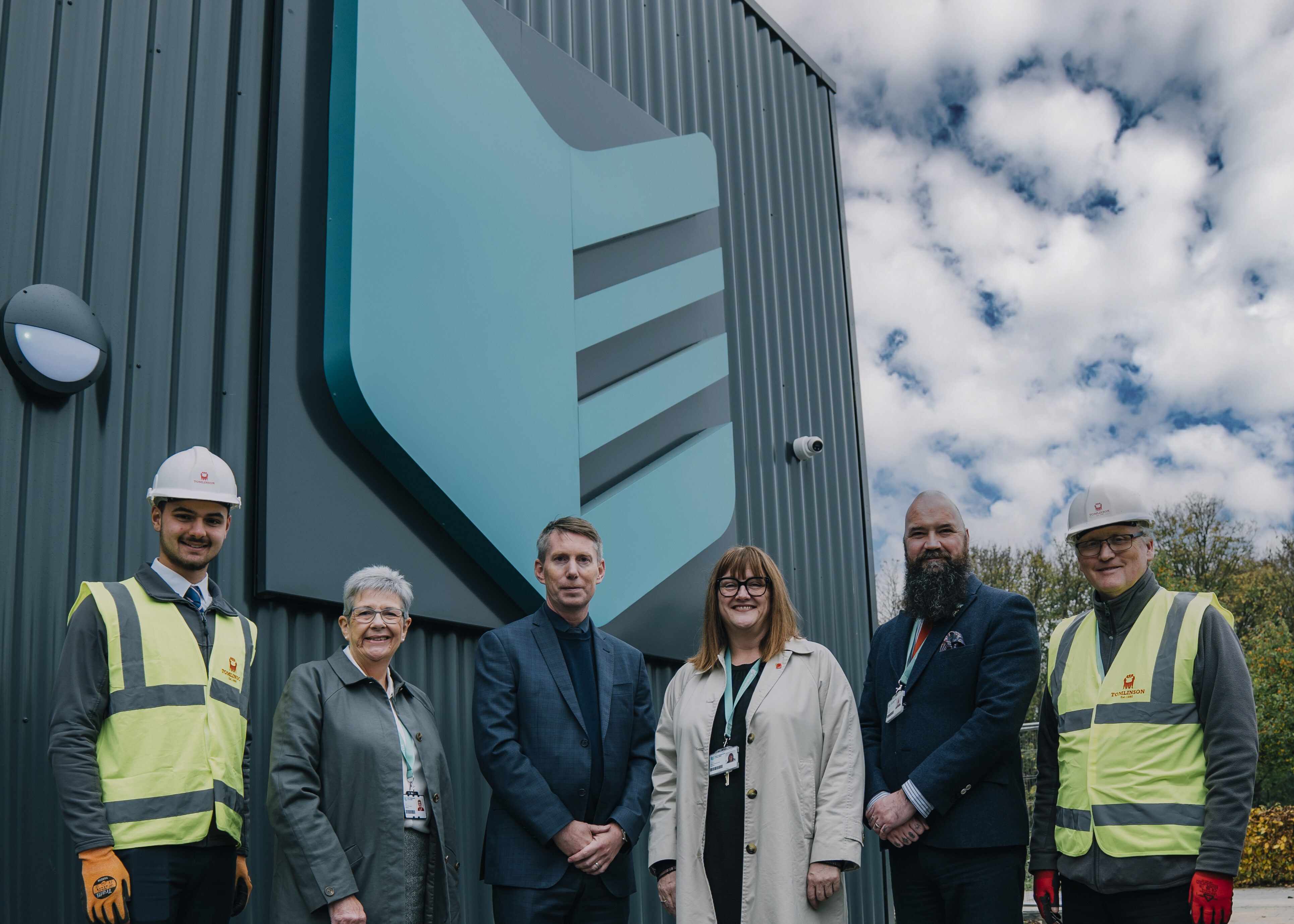 Staff standing outside the new Construction Skills Centre
