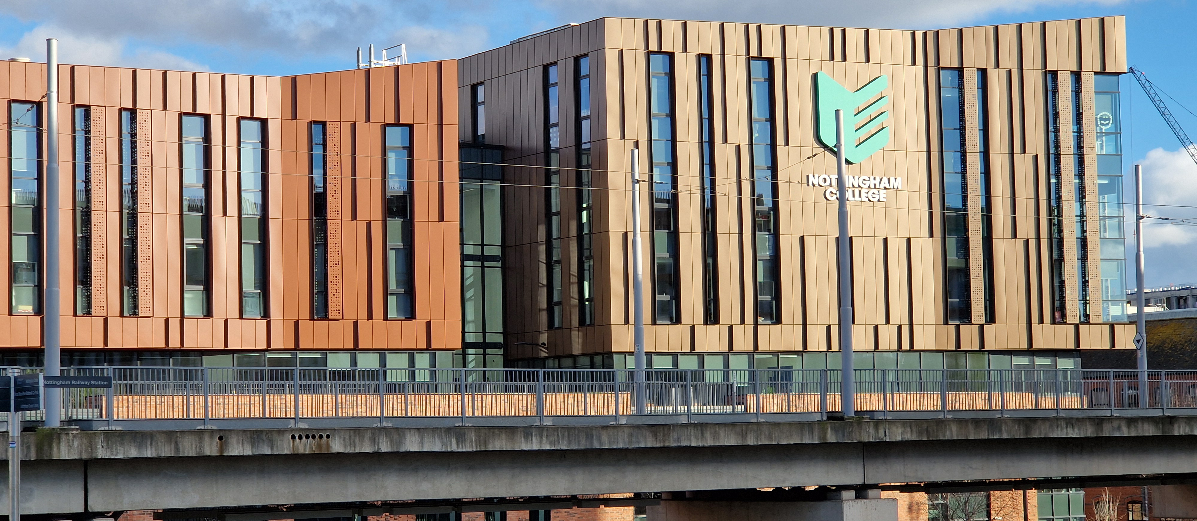 Front part of the City Hub with Tram bridge in the background
