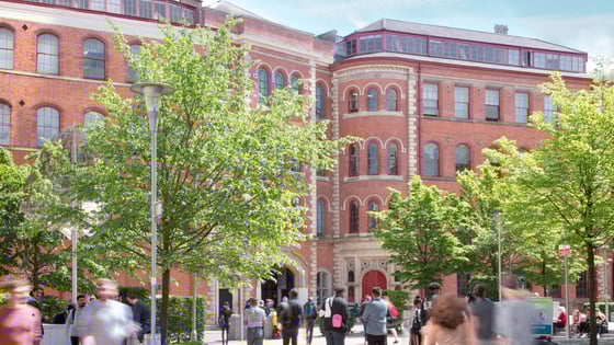 A picture of students St Mary's Place in Nottingham with the Adams Building in the background.
