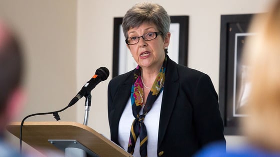 Carole Thorogood, the Chair of Governors, speaking at a staff conference.