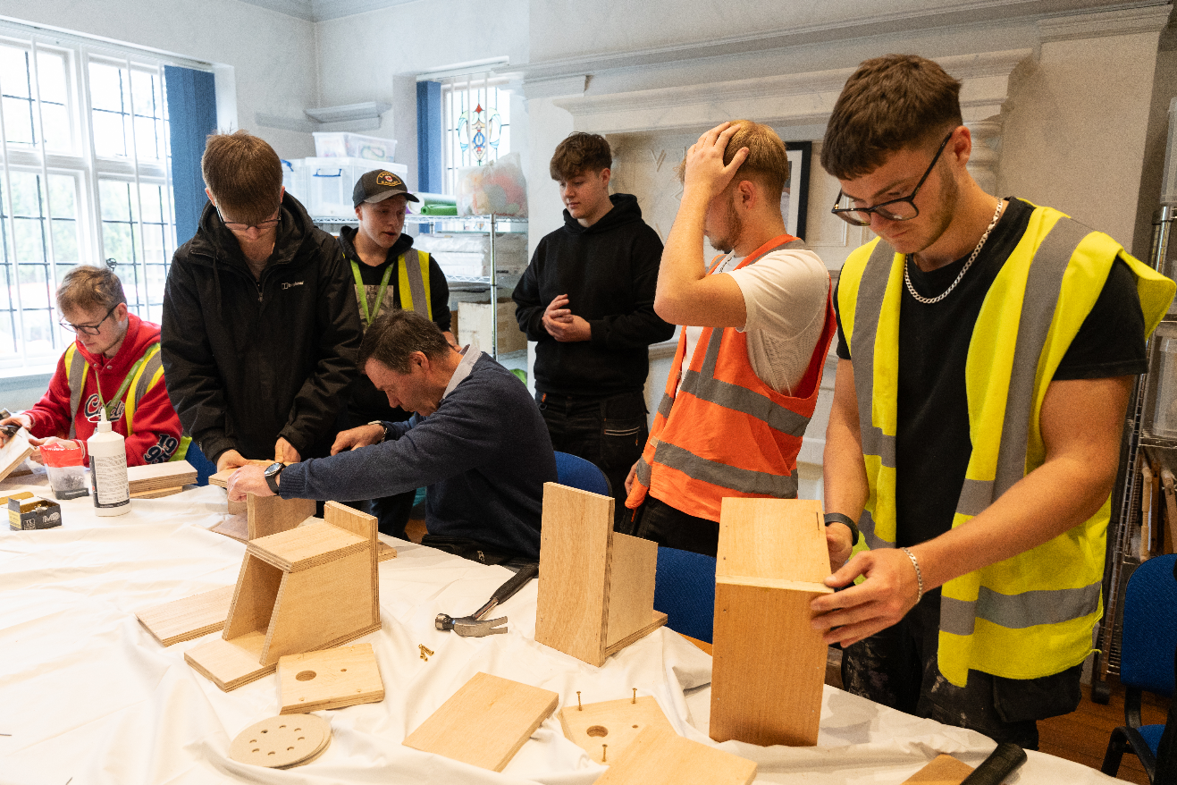 Students building bird boxes at Headway.