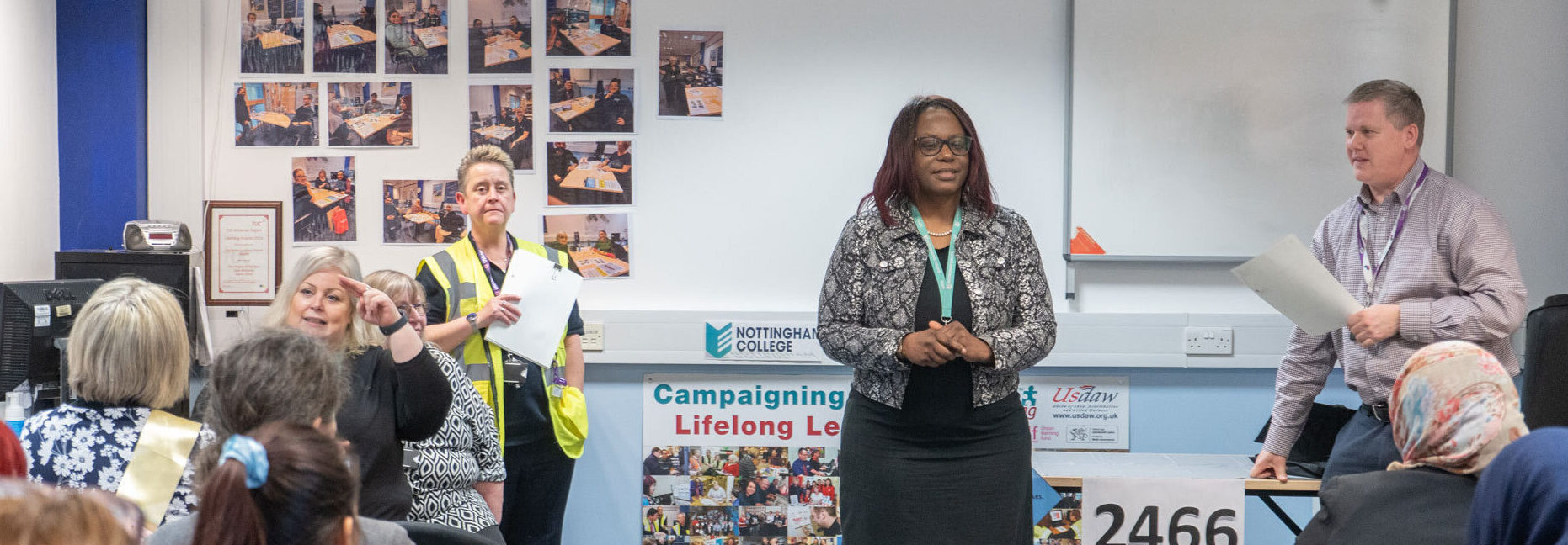 College staff member talking to employers