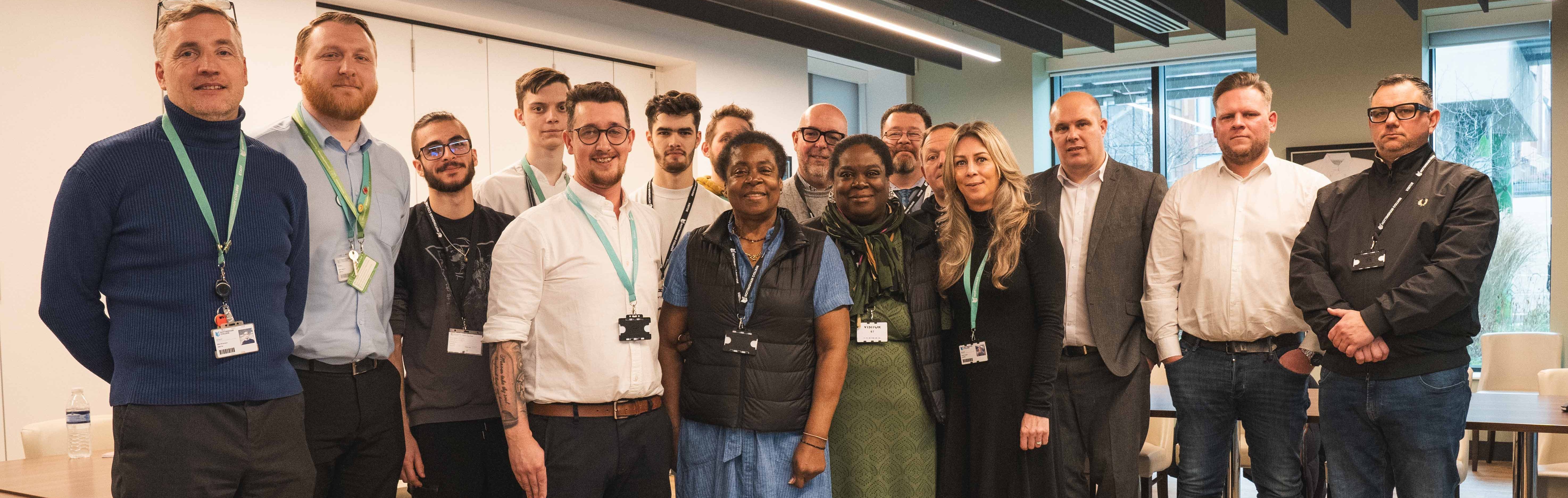 A group of industry professionals meeting to discuss how the teaching programme can improve