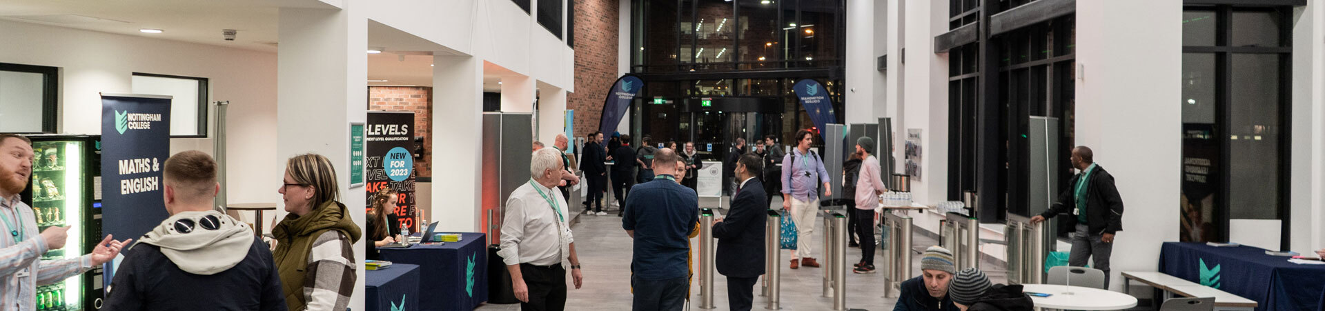 Visitors at an Open Evening inside the City Hub atrium.