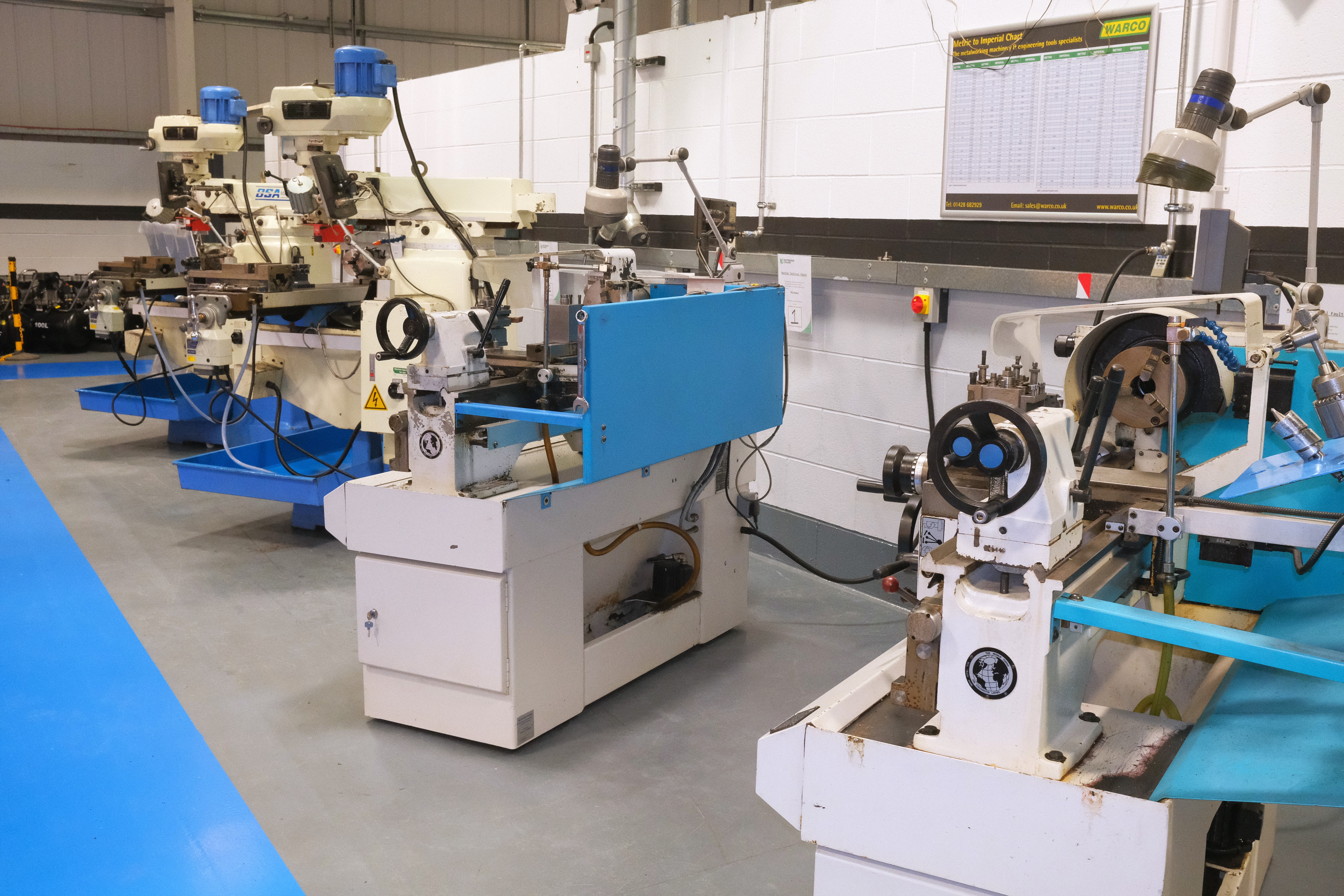 Engineering machines in a workshop.