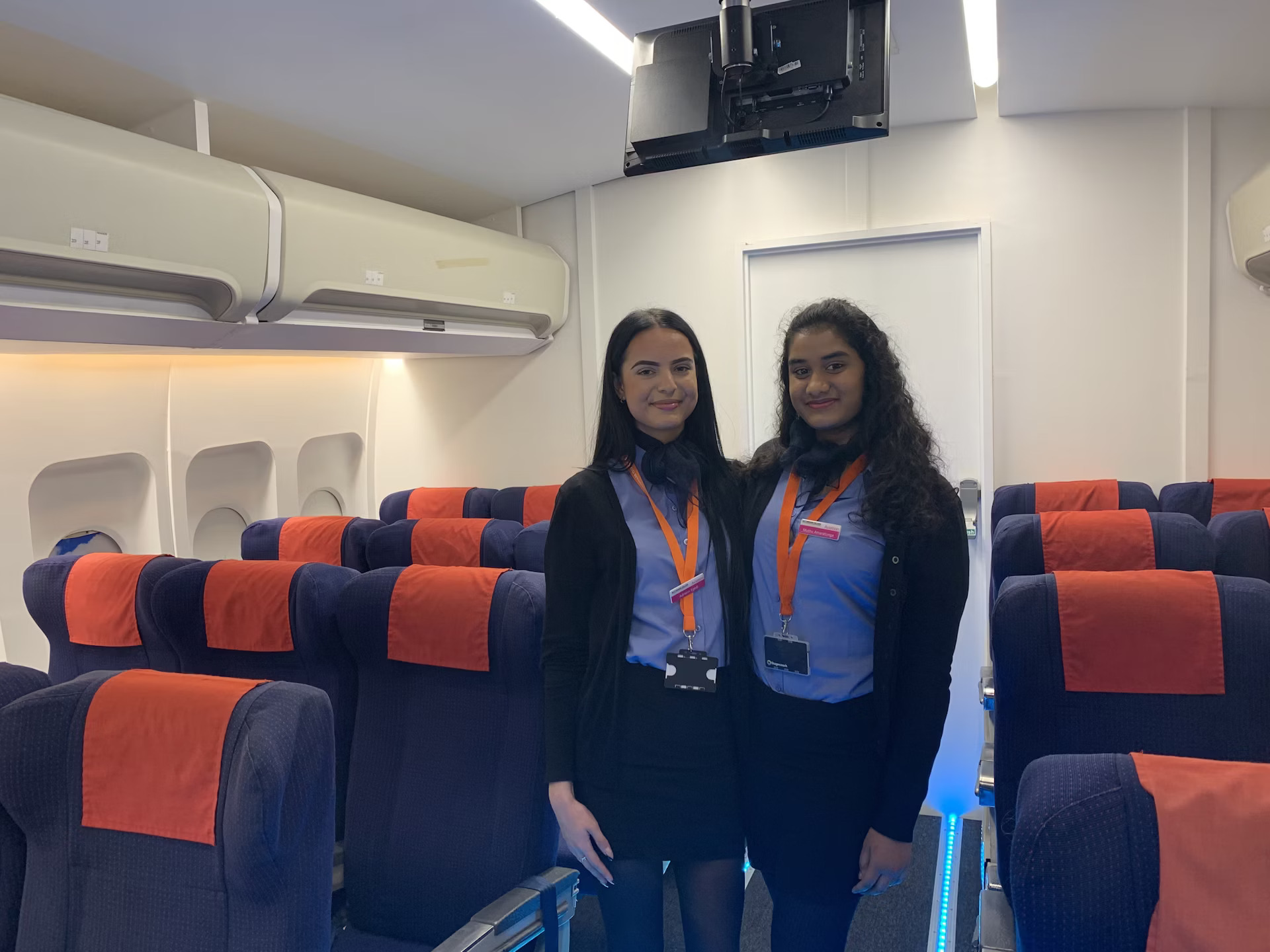 Students in the airline cabin in the City Hub