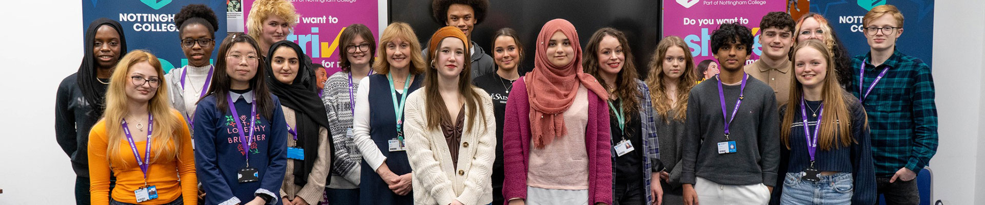Strive programme students with members of staff at the celebration
