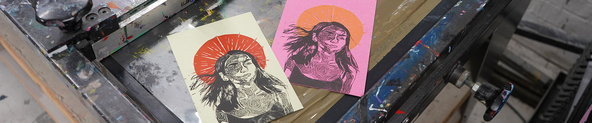 Student's artwork on a screenprinter