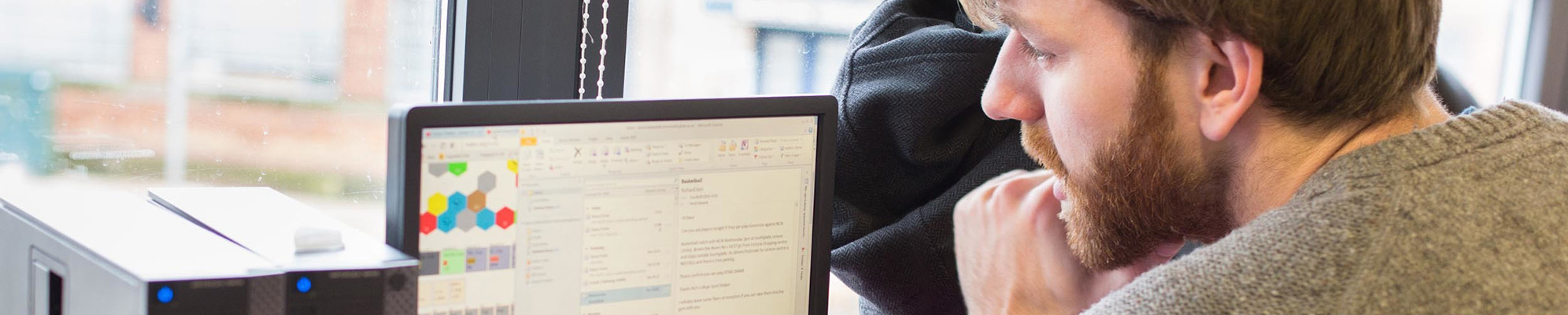 A student sitting at a computer