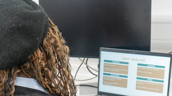 Business student working on their laptop