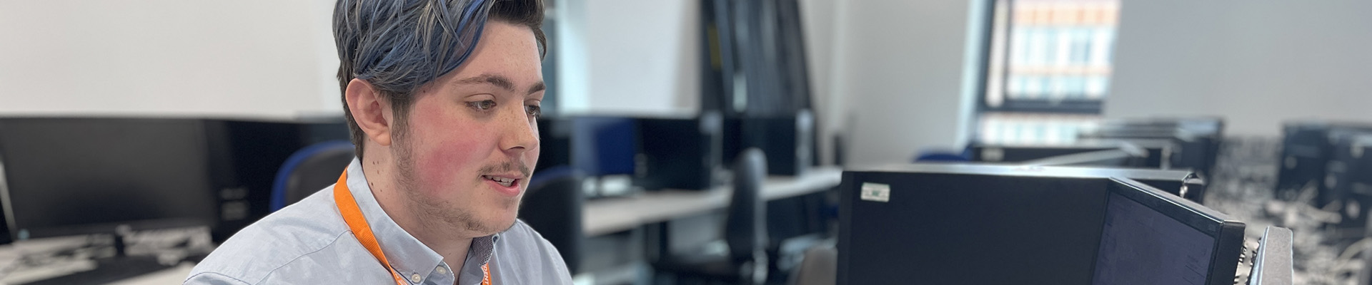 A student sitting at a computer