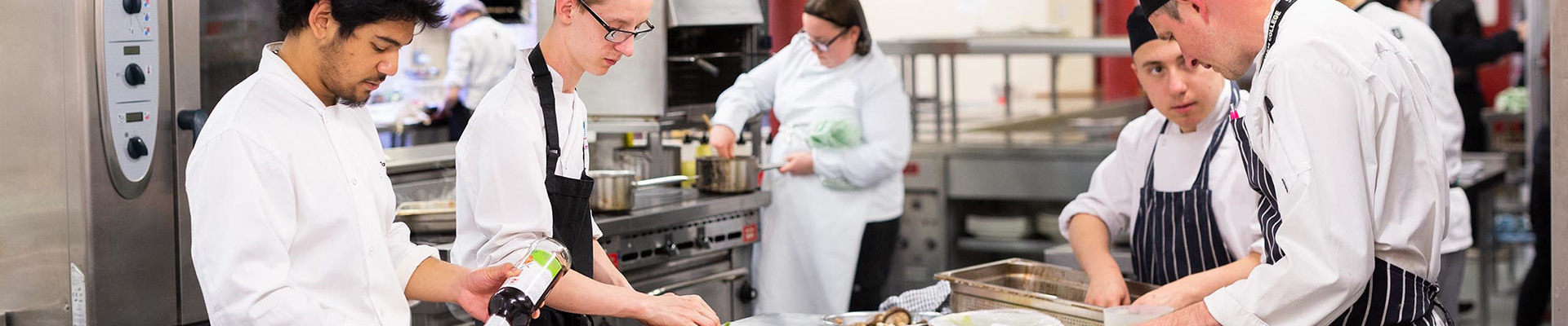 Catering students in the training kitchen at the City Hub
