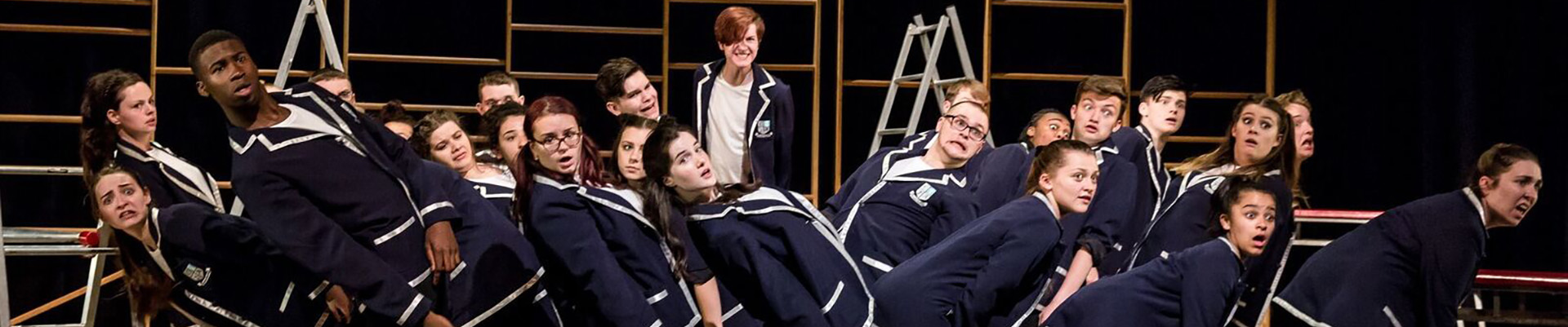 Students performing a stage play in the Nottingham College theatre.