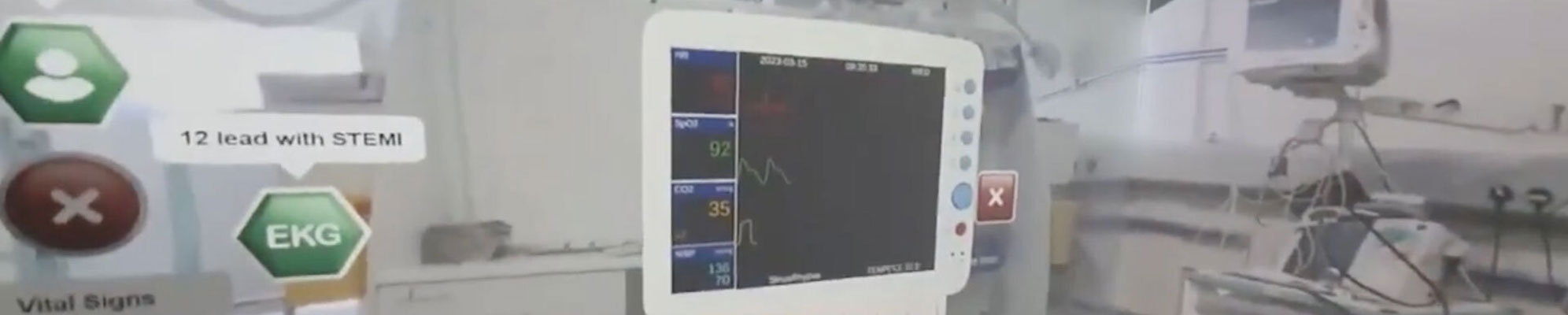 A picture of our simulated hospital ward showing monitors and question screens